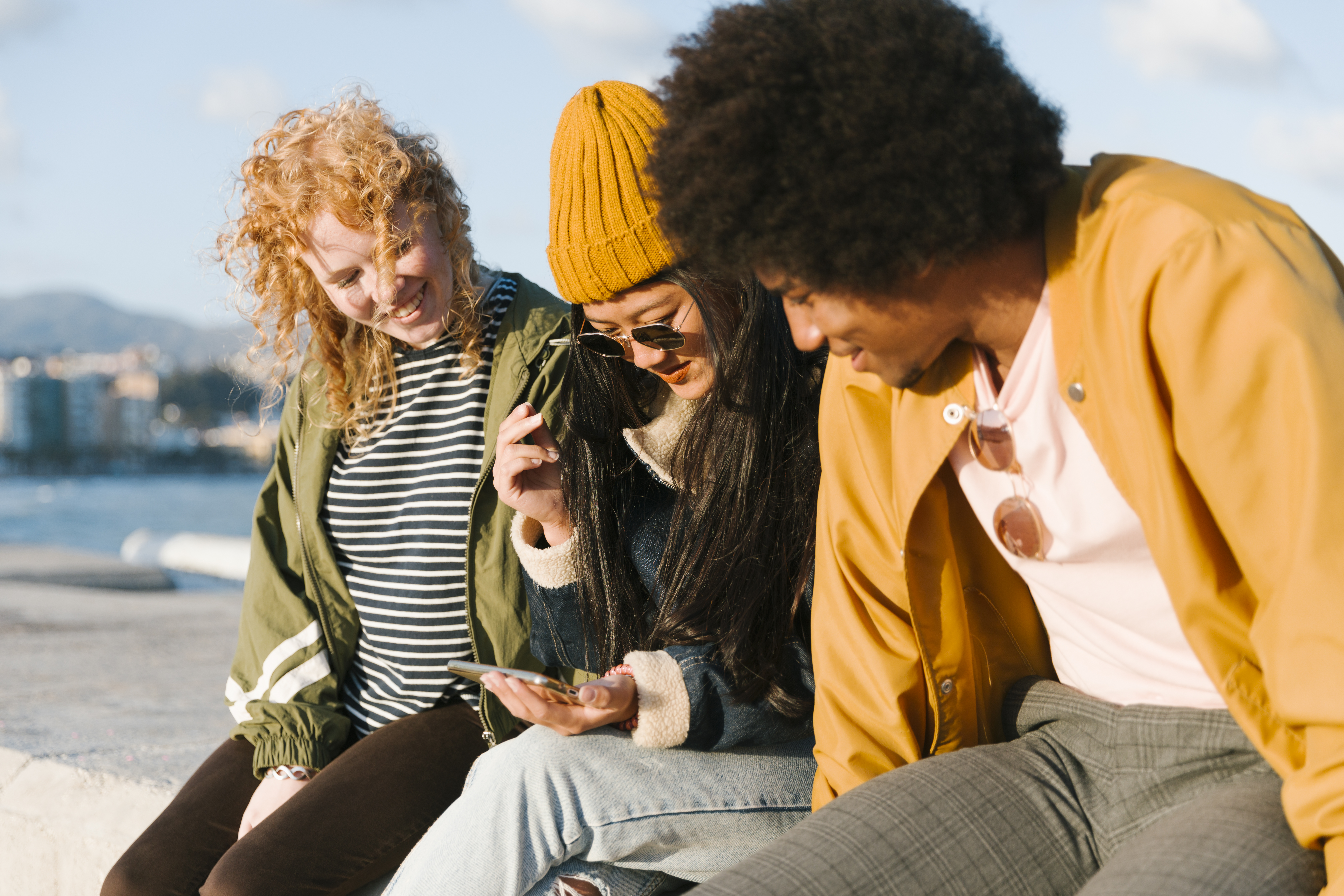 People taking surveys on devices